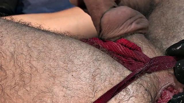 Hairy otter gets his lubed butthole buttplugged and fisted