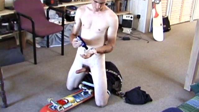 Dan Gets his Cock Hard and Edges to a Long Stroke Show, Then Pumps his Load Onto the Board.