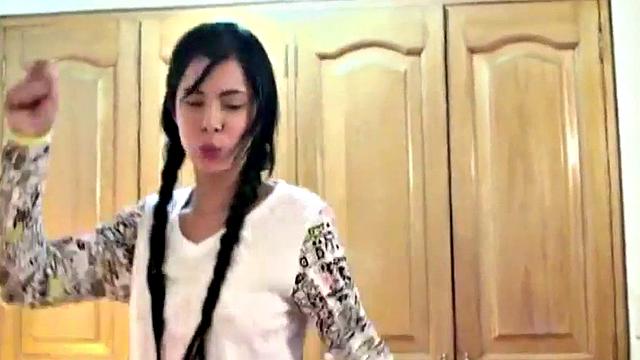 A kinky brunette tease herself with pigtails in the bedroom