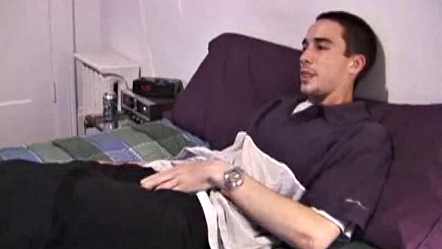 Young amateur Mario pulls down his pants, spies the porn video, works out his cock, and delivers a sexy cum load for our enjoyment