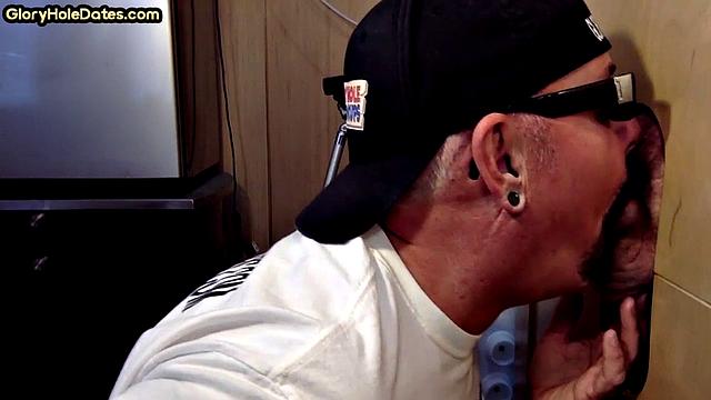 Gloryhole DILF sucks penis in homemade video