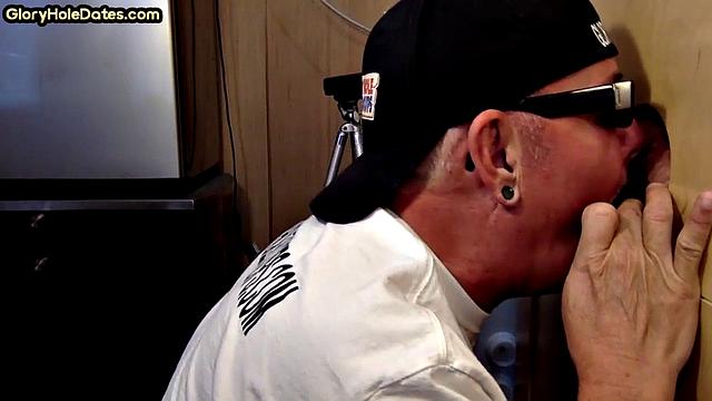 Gloryhole DILF sucks penis in homemade video