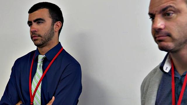 Watch as boss commands workers in wild anal sex with business suit attire