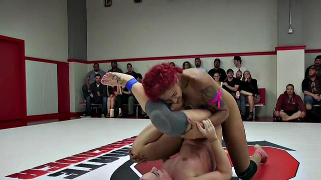 Naked wrestling dykes perform pussyfingering in public