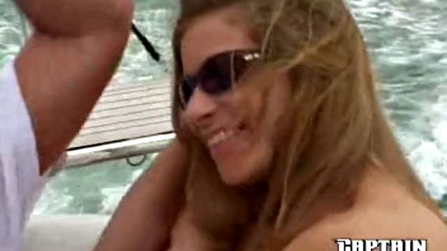 Two dudes get frisky with a bikini babe in a thong-clad boat