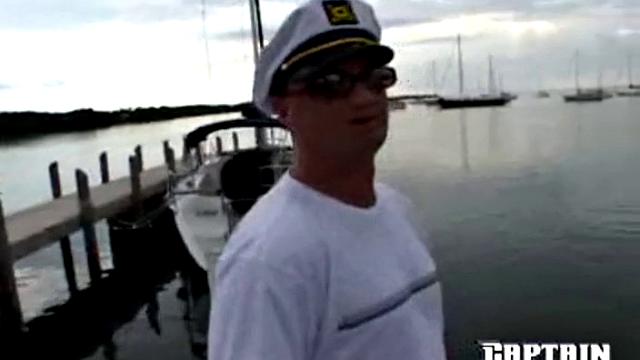 Two dudes get frisky with a bikini babe in a thong-clad boat