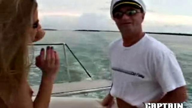 Two dudes get frisky with a bikini babe in a thong-clad boat