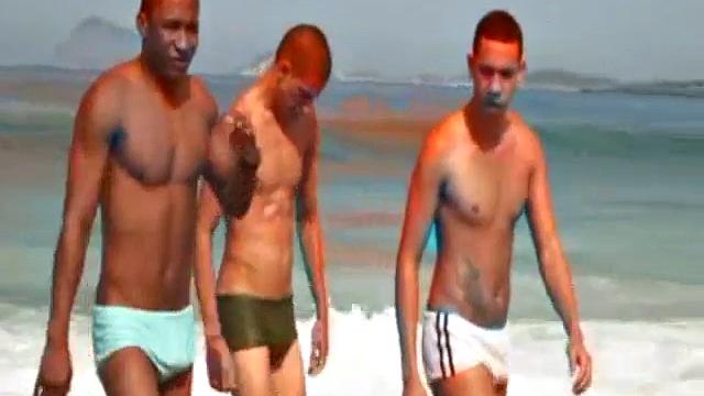 Mario Coelho, Estevam Lobo, and Adrian Correa Show Off at the Beach. When They Get Into a Shower There's Hardly Room for All the Big Latin Cock. Estevam Immediately Gets as Much Dick in His Mouth as He Can.