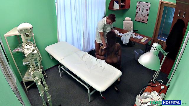 Check out this horny ebony babe getting her pussy examined in a hospital massage