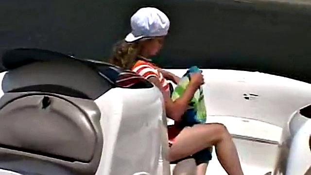 Sexy Little April playing with her snatch outdoors in rubber boat