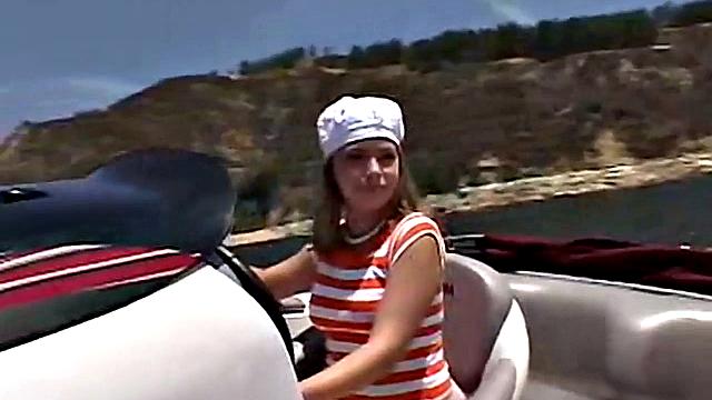 Sexy Little April playing with her snatch outdoors in rubber boat