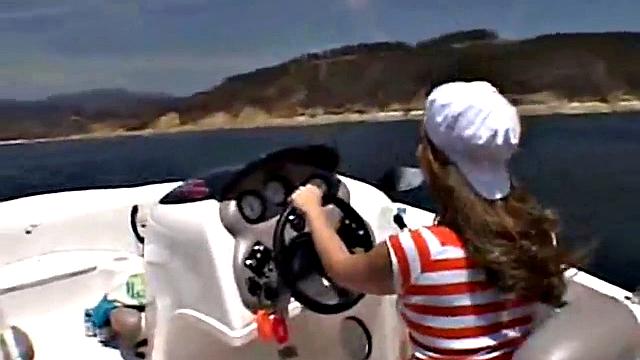 Sexy Little April playing with her snatch outdoors in rubber boat