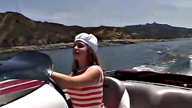 Sexy Little April playing with her snatch outdoors in rubber boat