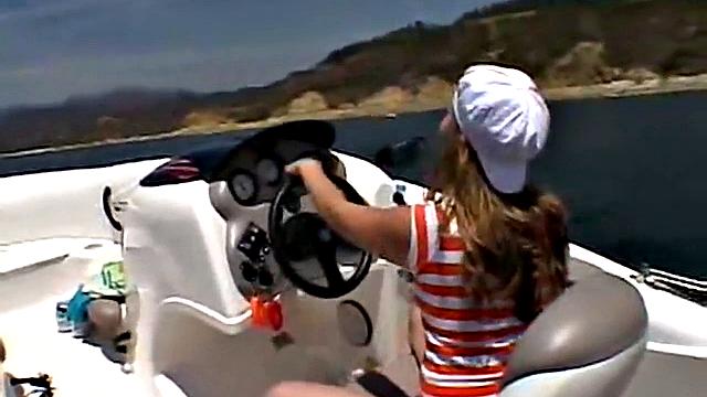 Sexy Little April playing with her snatch outdoors in rubber boat