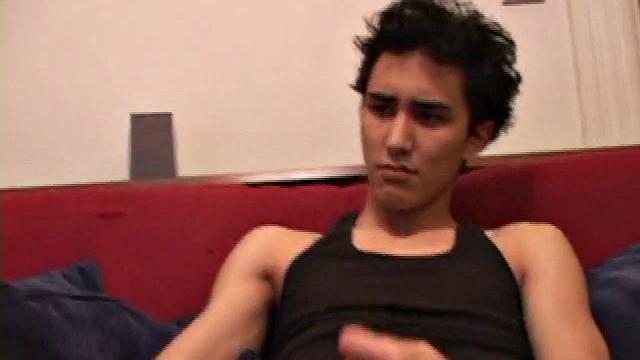 Emilio strokes his hard cock and shoots a big load into his hands