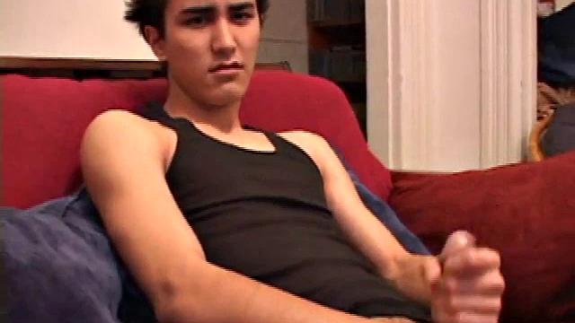 Emilio strokes his hard cock and shoots a big load into his hands