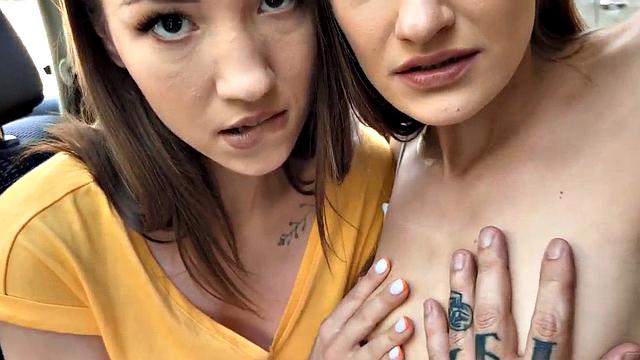 Skinny babes in car kissing and cuddling in front of voyeur