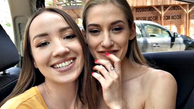 Skinny babes in car kissing and cuddling in front of voyeur