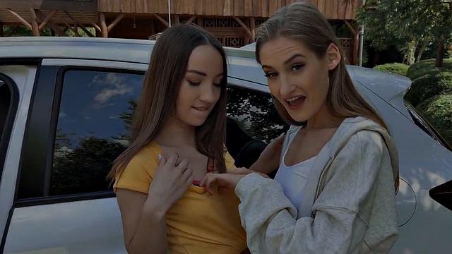 Skinny babes in car kissing and cuddling in front of voyeur