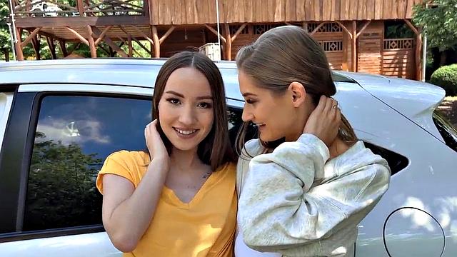 Skinny babes in car kissing and cuddling in front of voyeur