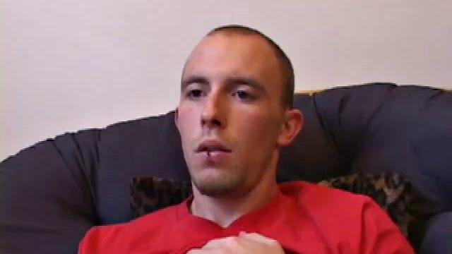 Lean and mean Corbin Ross peels off his jeans and plops down to start working up a stiff one. He lifts his red shirt to reveal his flat abs and keep from soiling it with the cum shot he's working on.