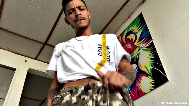 Latin boy Juan works up a stiff one and pushes his pants down just enough to release it. After stroking himself a bit, the skinny boy turns around to show off his butt and then gets back to giving his cock attention.