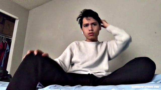 Latin twink Alex is perched on his bed, quickly strips off his pants and underwear, and begins working up a stiff one. Once he's sporting a big boner, Alex gets completely naked and starts beating his meat.