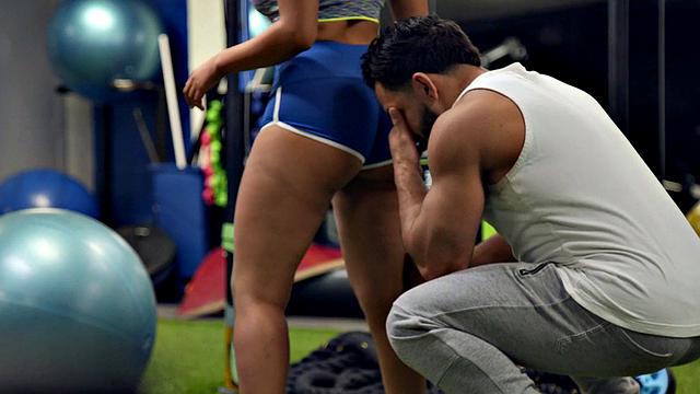 A hot chick get her big ass drilled in gym shorts while being watched by a voyeur