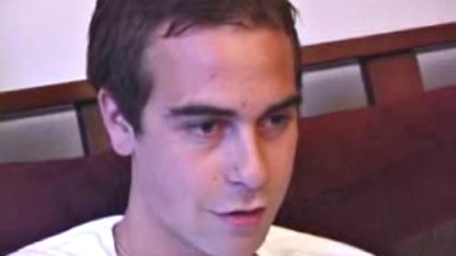 Vincenzo shows off his new purchase, strokes his cock, and uses a sex toy on the couch