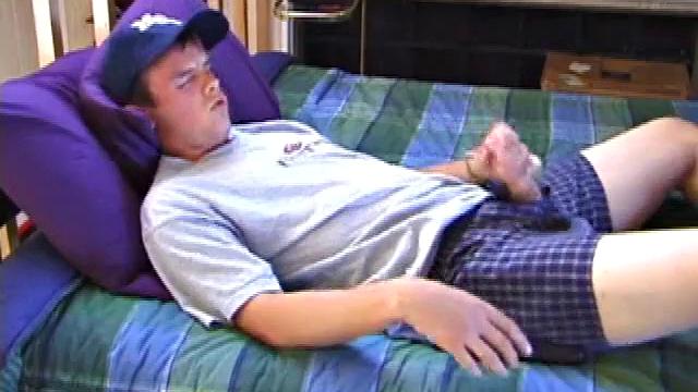 Sweet young Connor jerks off, lies down, sticks hands in pants, gets a stiff one, and cums all over his stomach