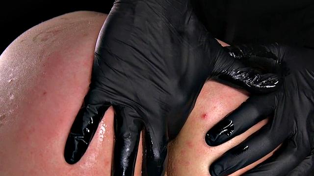 BDSM ballgagged Asian squirts during anal play by master