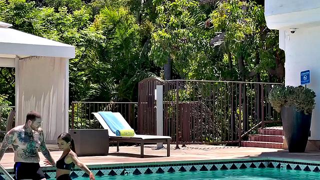 Genderfluid person pegged with strapon