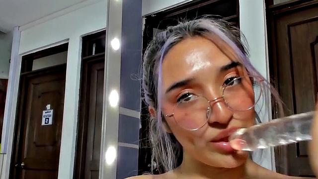 Stunning blonde babe fucks her bush with dildo