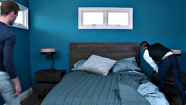 Thick inked bottom cutie gets barebacked by muscular black cop in bedroom