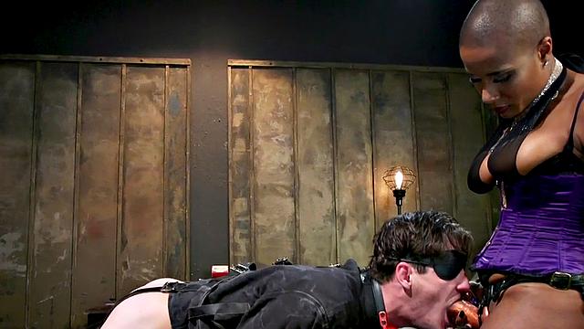 Black domina hits sissy balls and butt before bondage