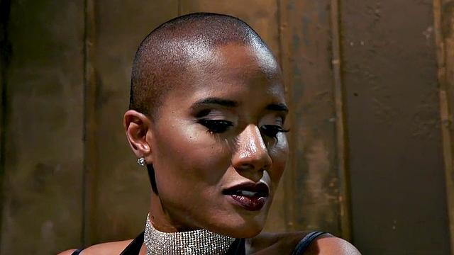 Black domina hits sissy balls and butt before bondage