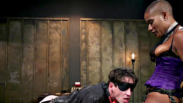 Black domina hits sissy balls and butt before bondage