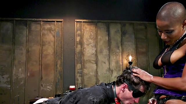 Black domina hits sissy balls and butt before bondage