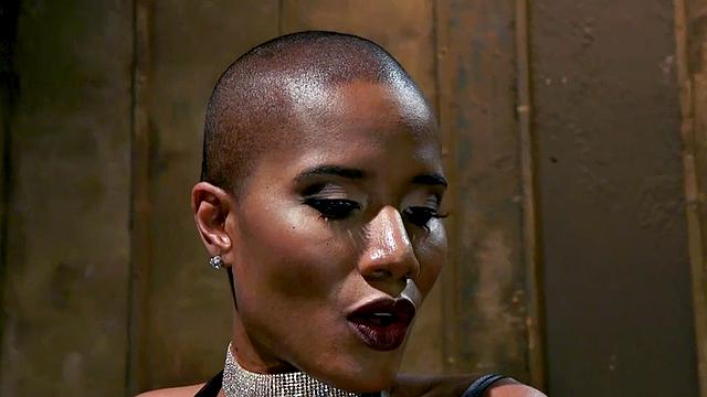 Black domina hits sissy balls and butt before bondage