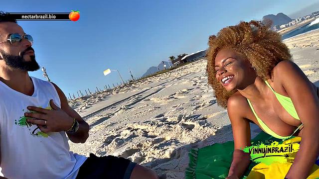 Naughty brunette seduced by actor on deserted beach!