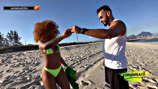 Naughty brunette seduced by actor on deserted beach!