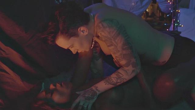 masc man pumping black pussy with strapon in couple