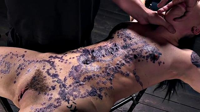 Submissive wax slut toyed in BDSM session