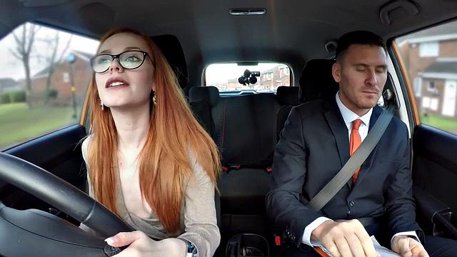 Geeky redhead blows and fucks driving instructor