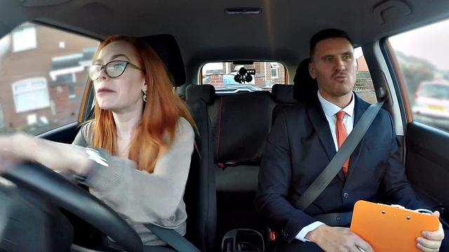 Geeky redhead blows and fucks driving instructor