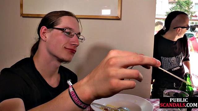 Tied chick giving head in public café