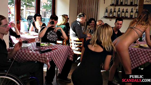 Tied chick giving head in public café