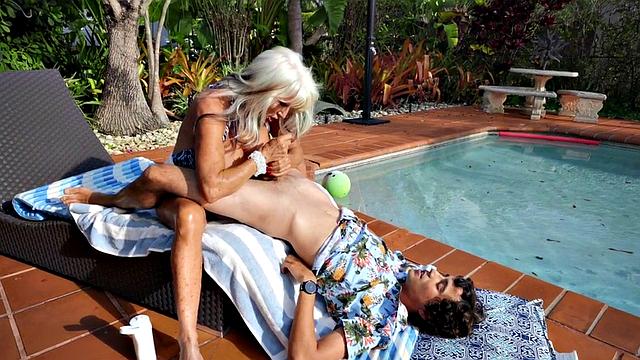 Watch this horny granny with massive tits take a hard pounding from behind after tit-fucking in erotic couple