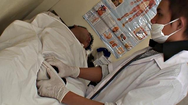 Asian stud gets a thorough check-up before being bred by medic in uniform