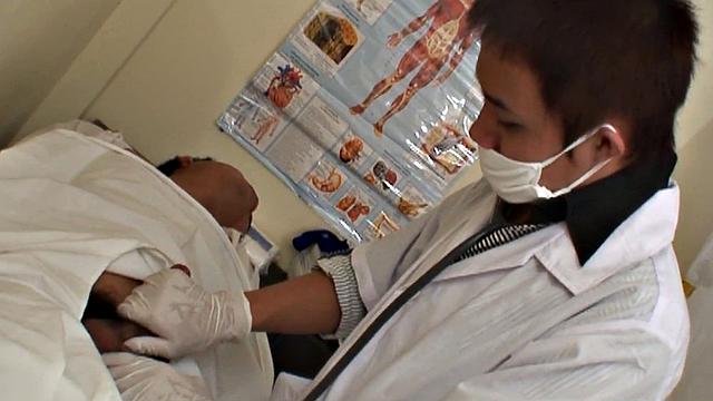 Asian stud gets a thorough check-up before being bred by medic in uniform